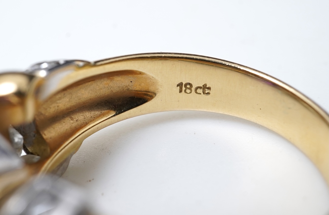 An amethyst and diamond ring